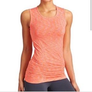 Pre worn good condition Athleta orange space dye ruched tank. Size Medium